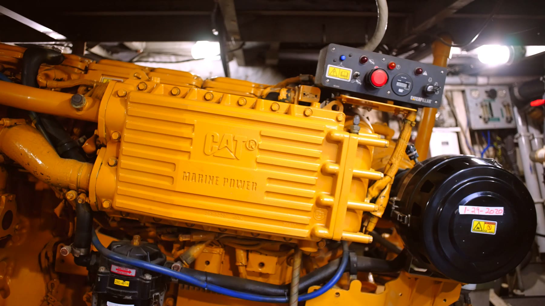 Turbocharged heavy-duty diesel engine installed in a marine engine room