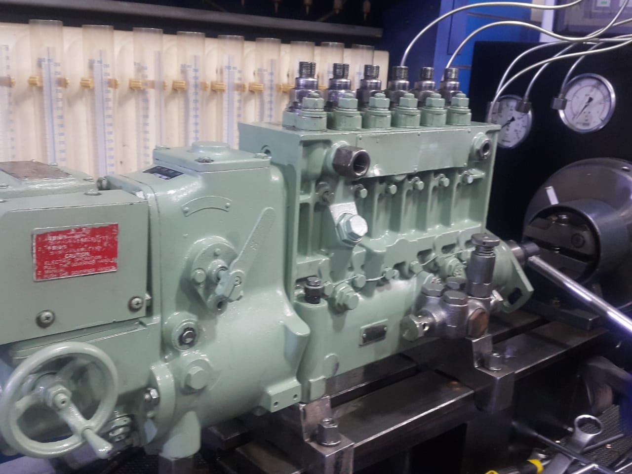 Inline diesel injection pump under test in the workshop