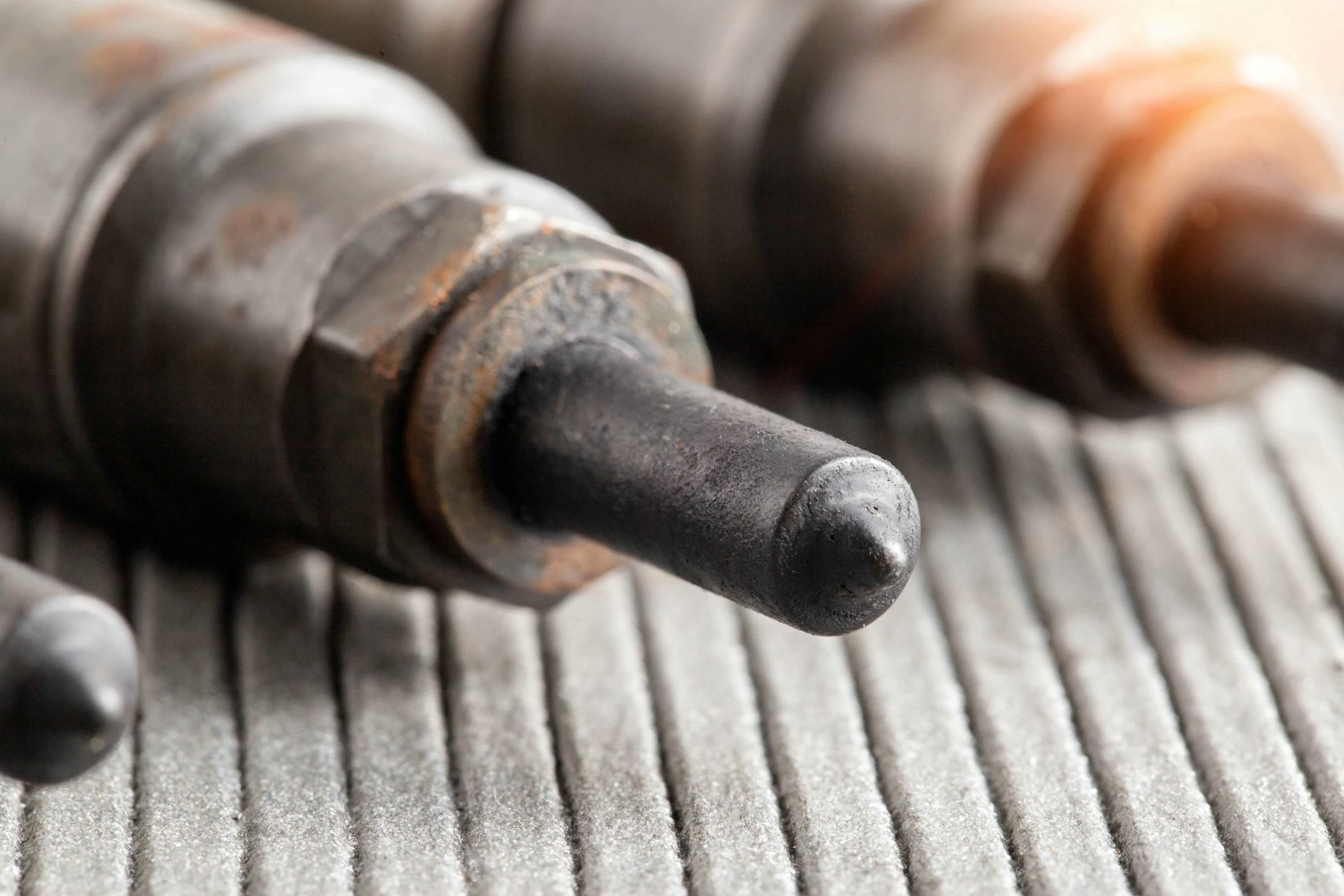 Close view of diesel injector nozzle tips for condition inspection