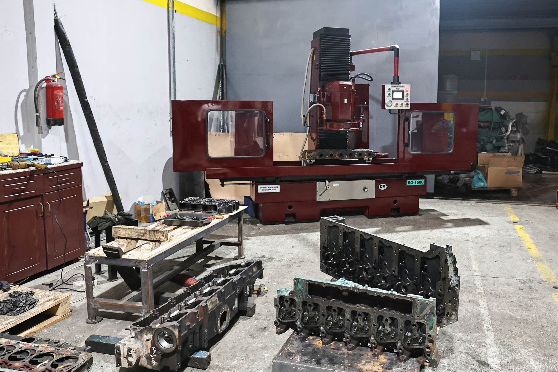 Engine components and machining equipment on the Abra Diesel shop floor